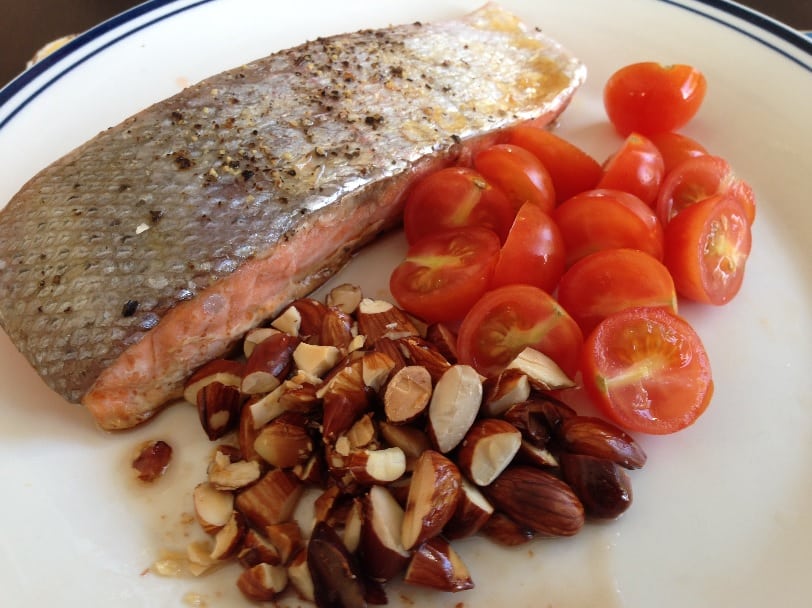 Salmon nuts and tomatoes